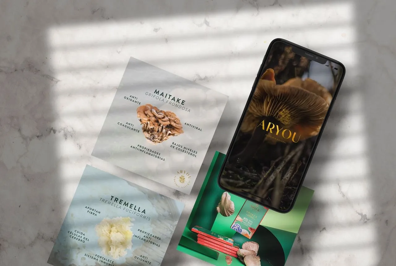 Mushroom cards and a phone showing the brand