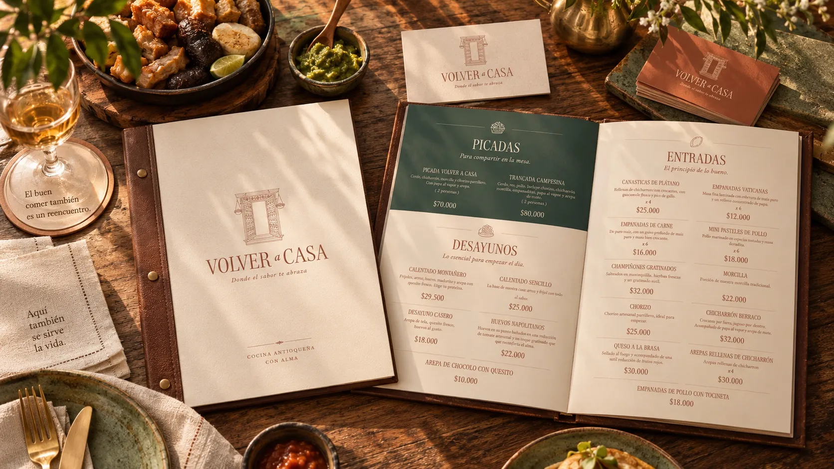 Volver a Casa menu and stationery on the table